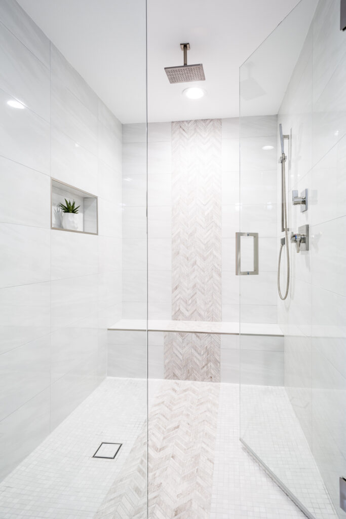 Large shower tiles with accent