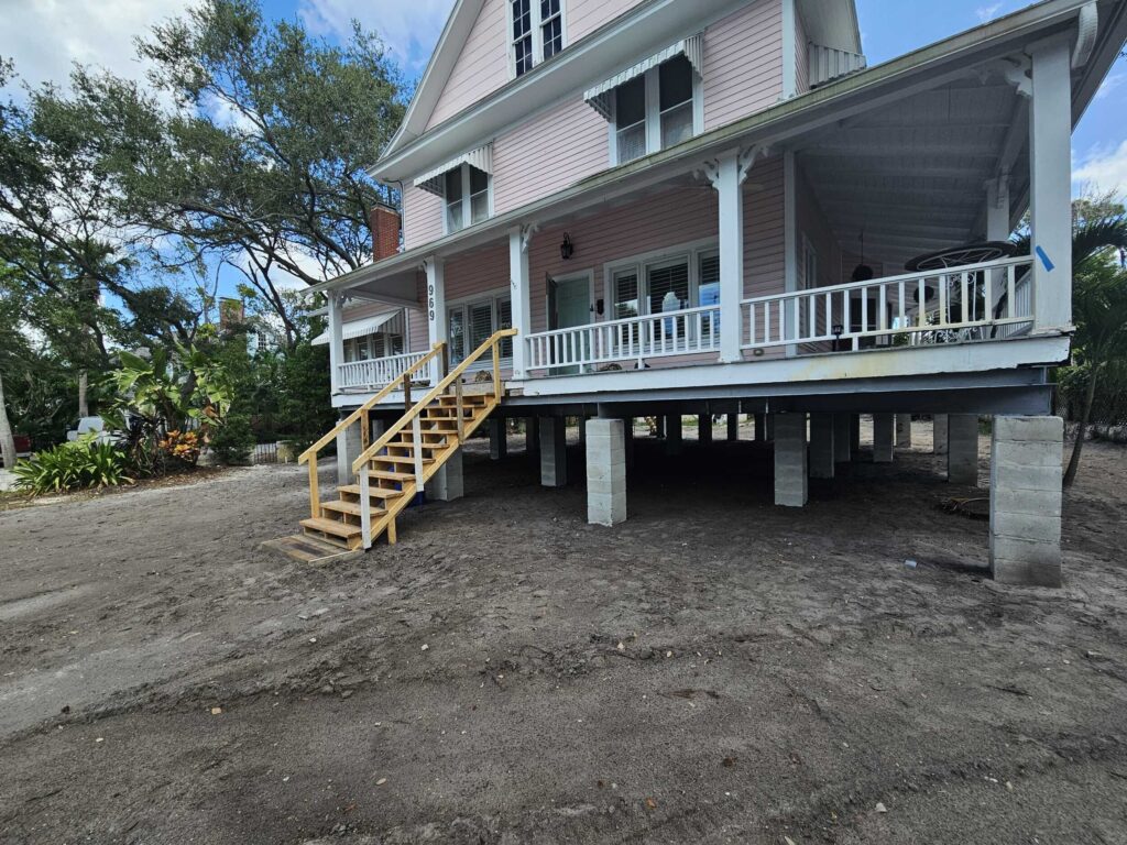 Existing Florida home elevated on concrete piers to meet flood-zone requirements